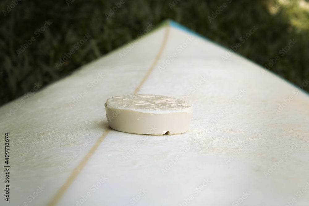 wax_puck_on_surfboard
